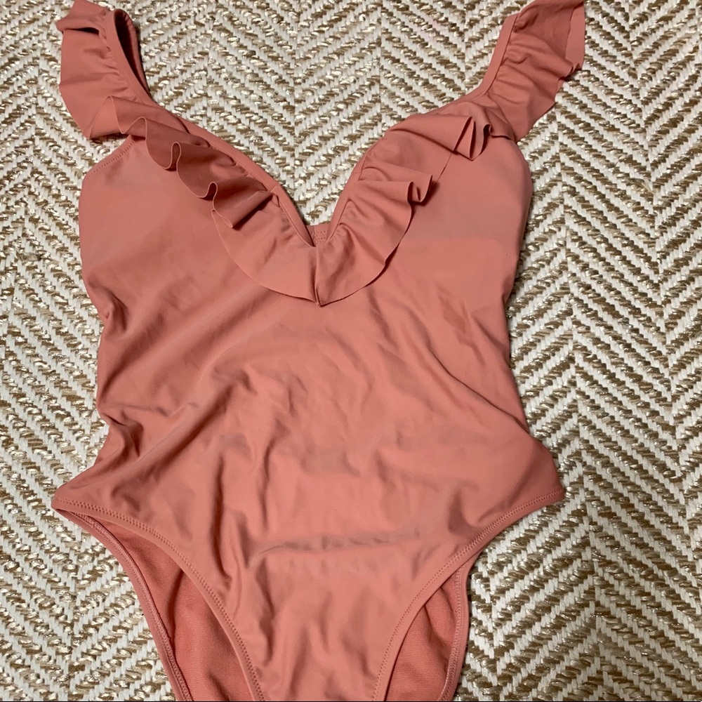 Express ruffle one piece. Medium